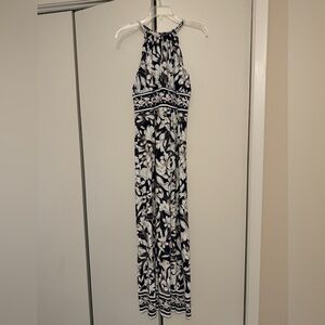 Dressy long dress. Single button in back, pull on.